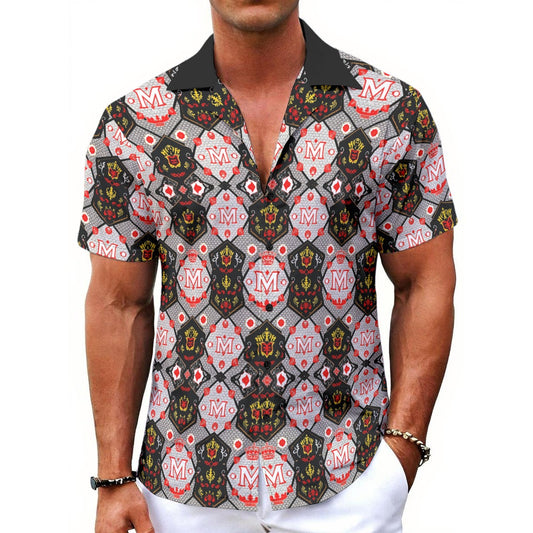 Munsieur all-over print button up tee with colorful geometric and emblem patterns on short sleeves