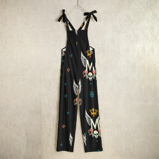 Munsieur luxury all-over print jumpsuit black with skull wing and crown design hanging on hanger