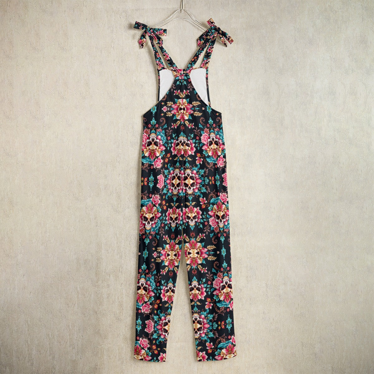 Munsieur luxury floral print jumpsuit with adjustable tie straps and vibrant multicolor design