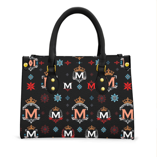 Luxury women's handbag by Munsieur with black base and colorful crown and M logo pattern
