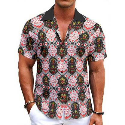 Munsieur all-over print button up tee with black collar and red white black patterned design