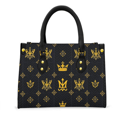 Munsieur designer black handbag with zip pocket featuring gold emblem pattern and black handles