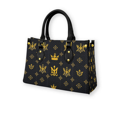 Designer black handbag with zip pocket featuring gold emblem pattern and black handles