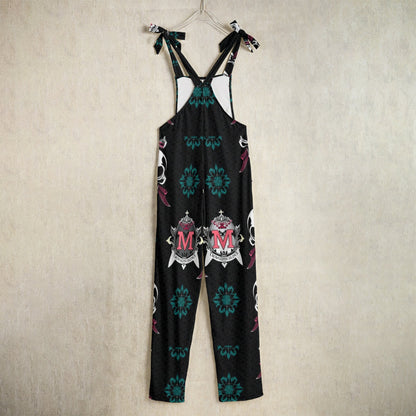 Munsieur designer bold graphic jumpsuit for women in black with colorful emblem and floral patterns
