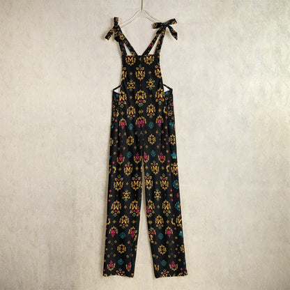Munsieur designer women's jumpsuit with gold print featuring adjustable shoulder ties and colorful accents