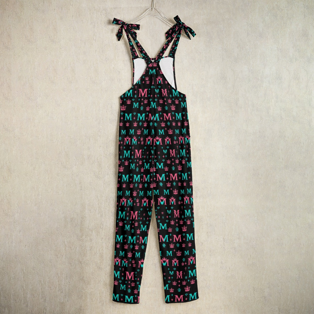 Luxury designer women's jumpsuit by Munsieur with multicolor M pattern and shoulder tie straps
