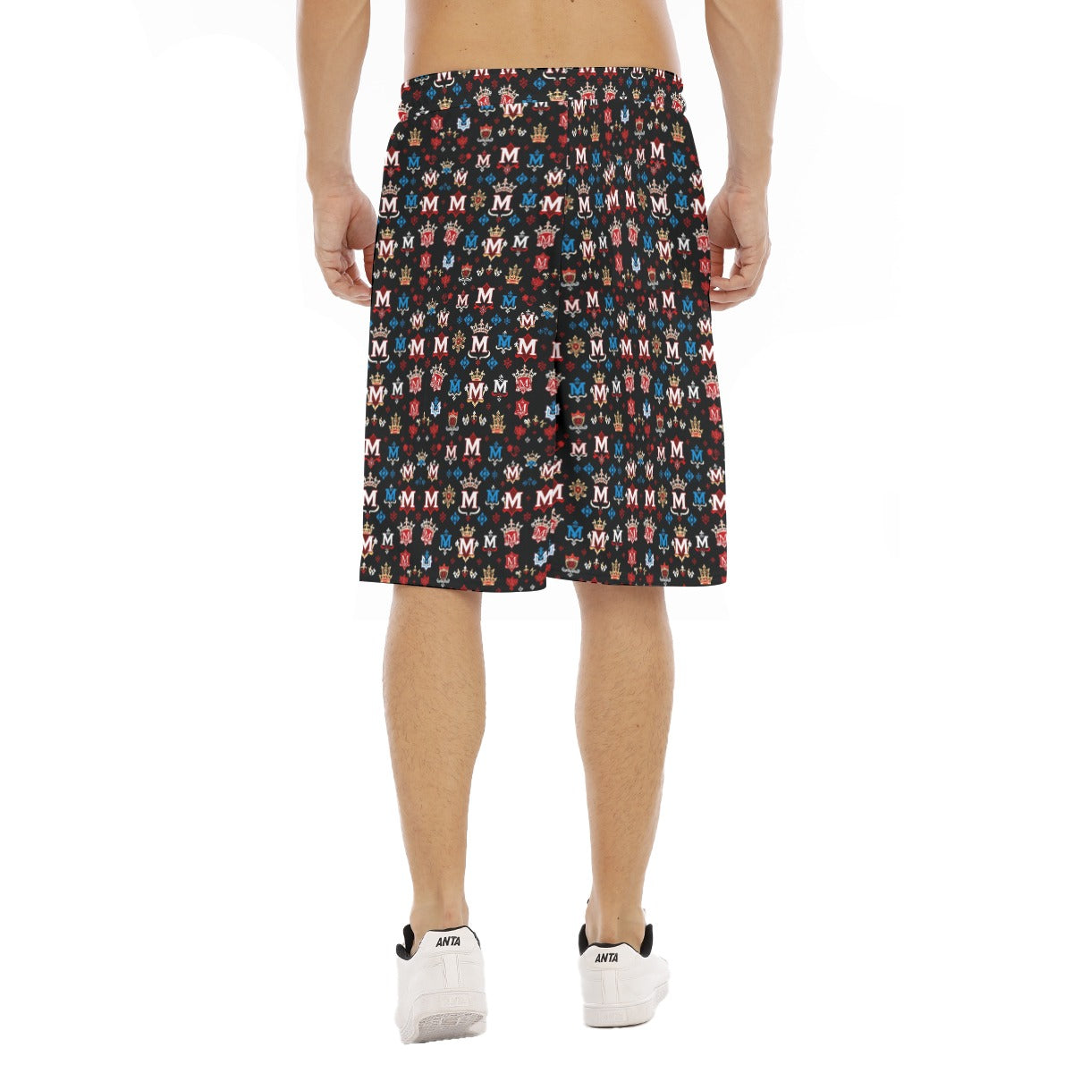 Back view of man wearing Munsieur luxury men's fashion shorts with colorful pattern and white sneakers