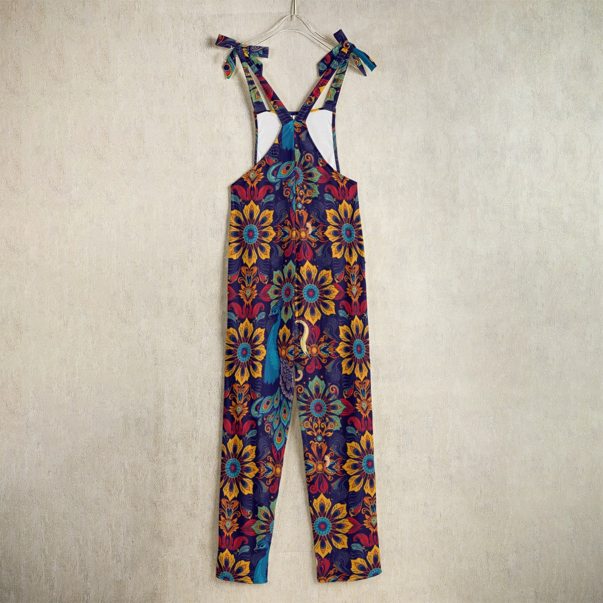 Luxury printed jumpsuit sale by Munsieur with vibrant floral and peacock design and adjustable shoulder ties