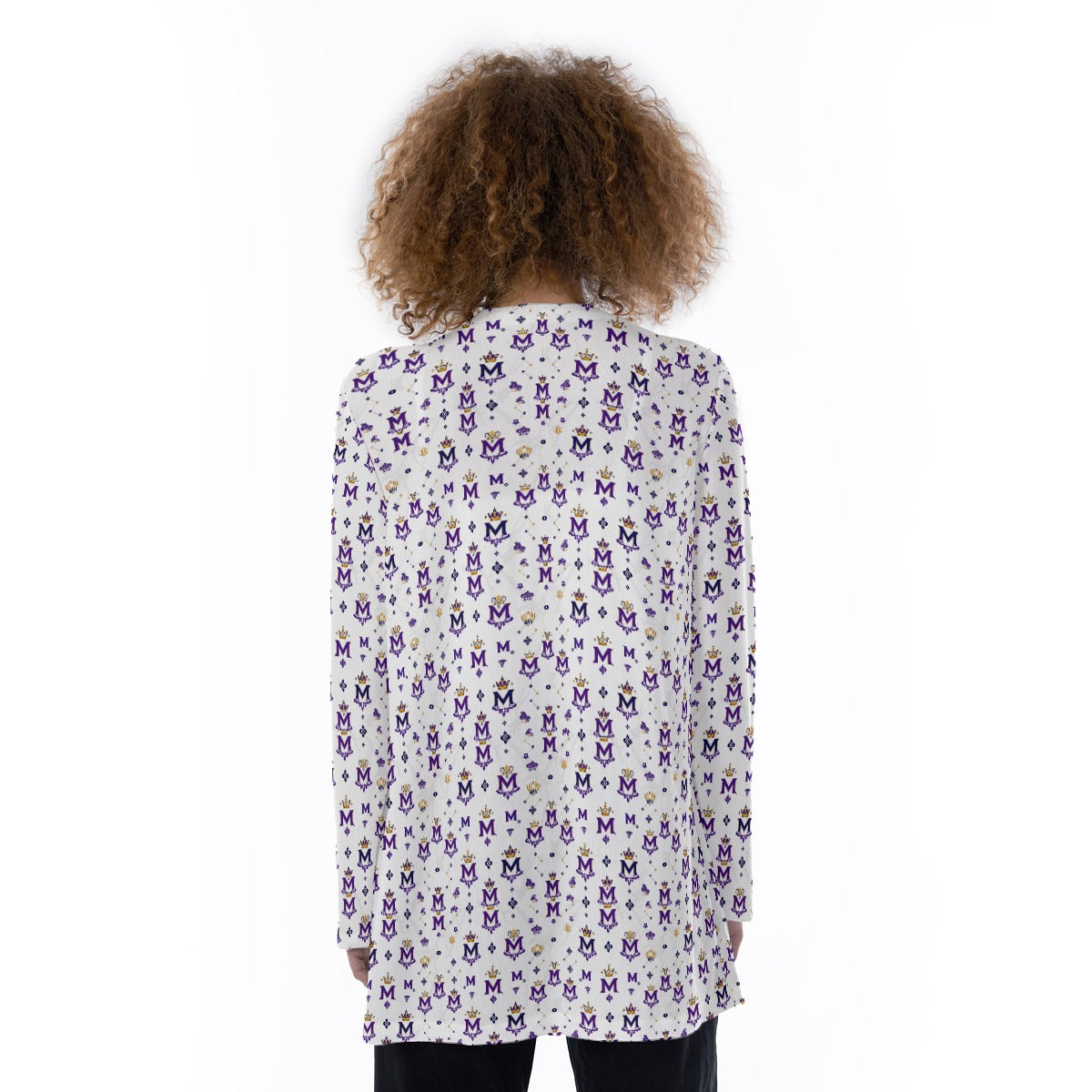 Back view of woman wearing Munsieur printed cardigan sweater with pockets featuring purple and yellow M pattern