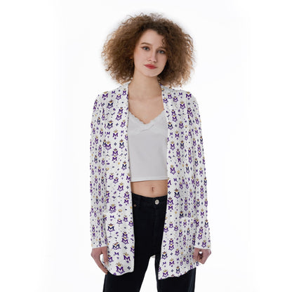 Munsieur printed cardigan sweater with pockets worn by woman over white tank top and black pants