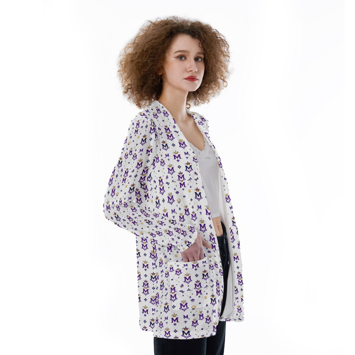 Munsieur printed cardigan sweater with pockets worn by woman with curly hair and white top