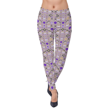 Munsieur urban luxury leggings with purple and gold geometric pattern worn with black heels