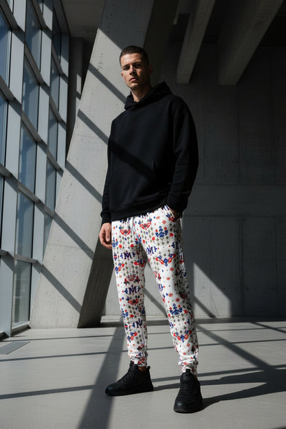 Munsieur white urban streetwear joggers with red blue and beige graphic patterns and elastic waistband