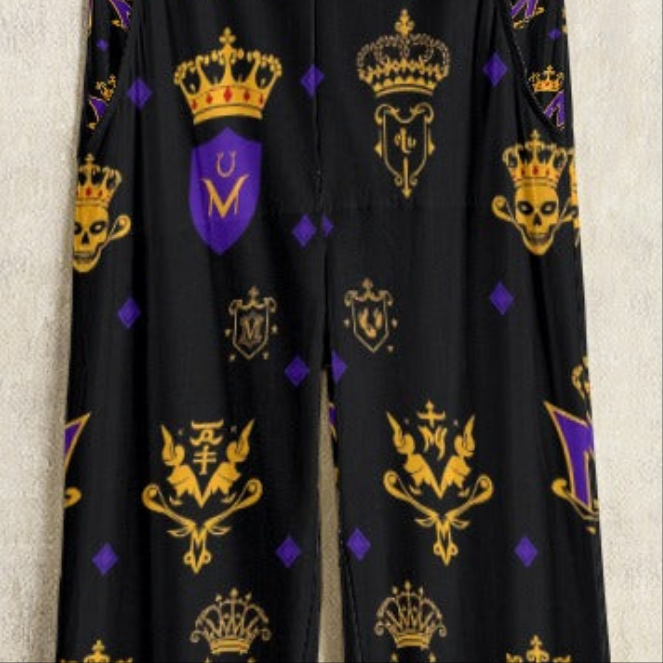 Munsieur luxury graphic patterned jumpsuit with black fabric featuring gold and purple crown and crest designs