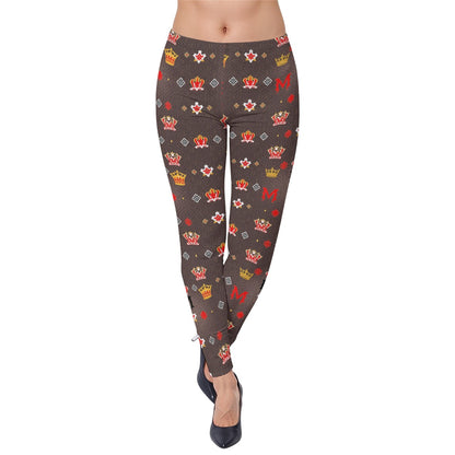Munsieur women's luxury print leggings with colorful crown and star patterns on dark background